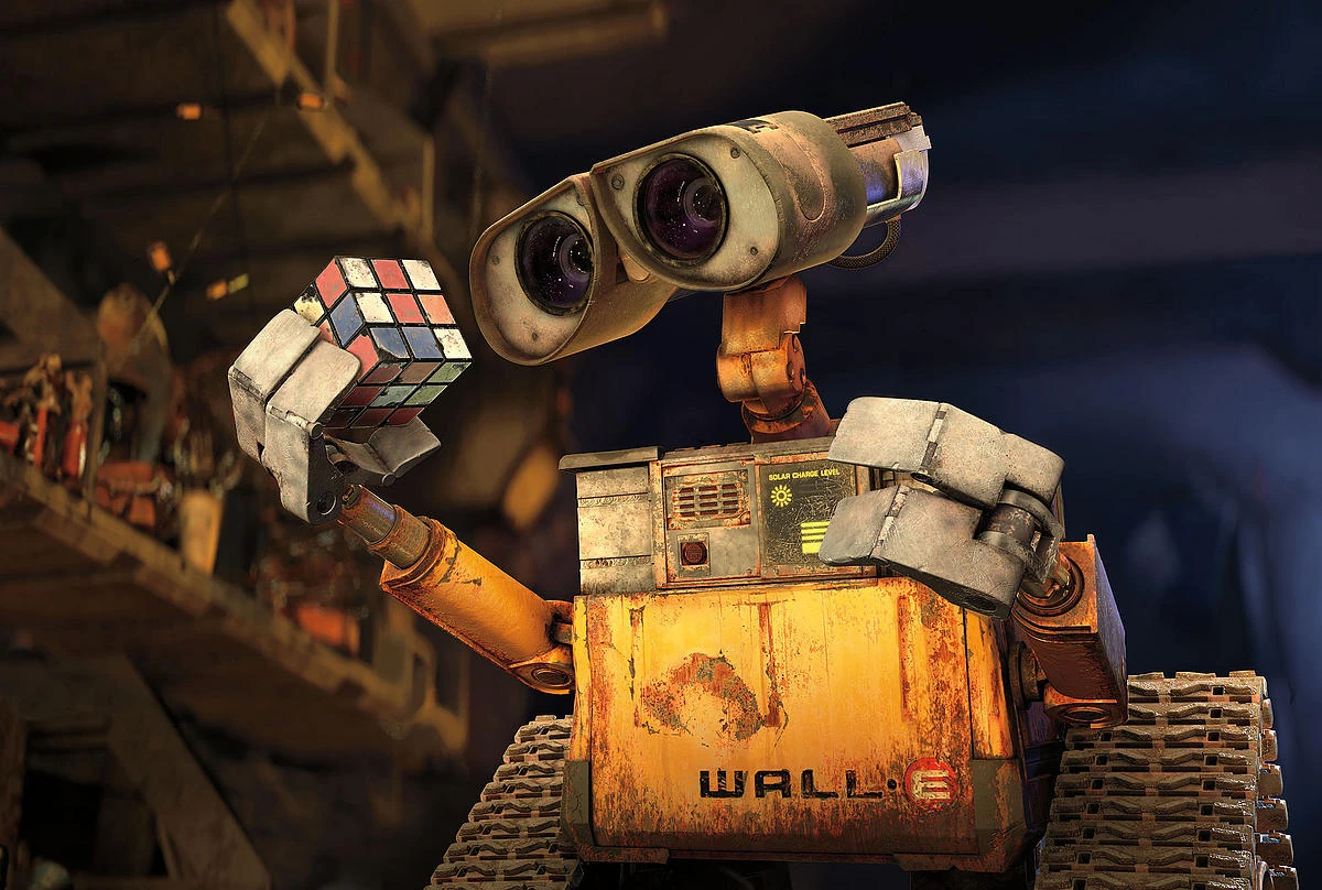 WALL-E holding a Rubik’s Cube, illustrating an approachable fictional robot.